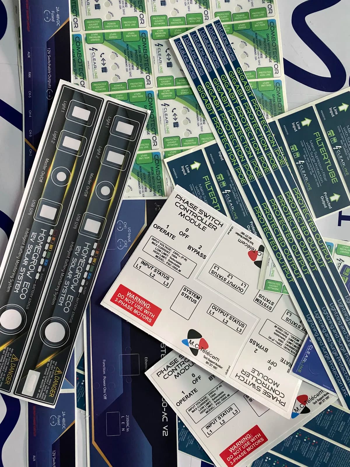 ClearLine mixed product labels spread on table