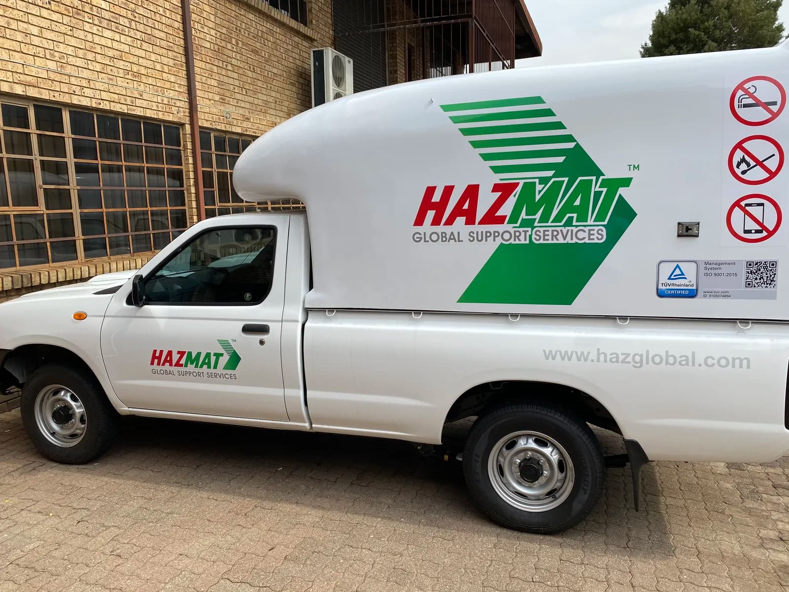 Hazmat branded bakkie showing website URL
